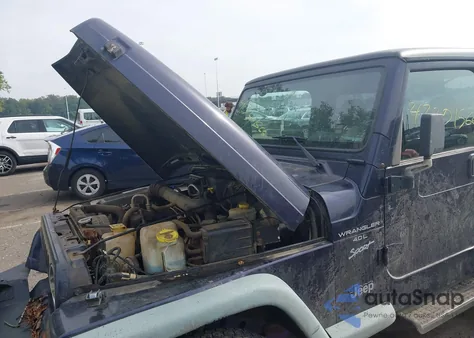 1999 Jeep Wrangler Sport z USA, uszkodzony, nr VIN 1J4FY19S5XP405523